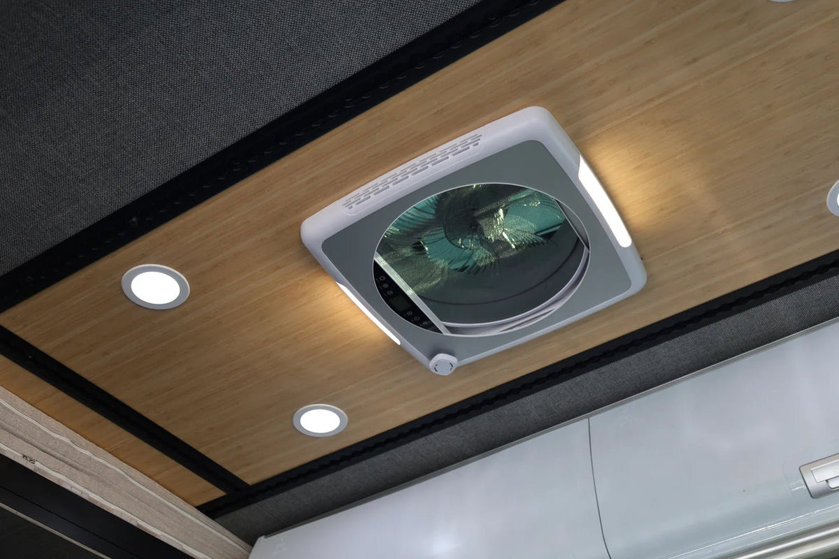 VANVENT roof vent fitted in a campervan ceiling with LED lighting on - EuroVan-shop
